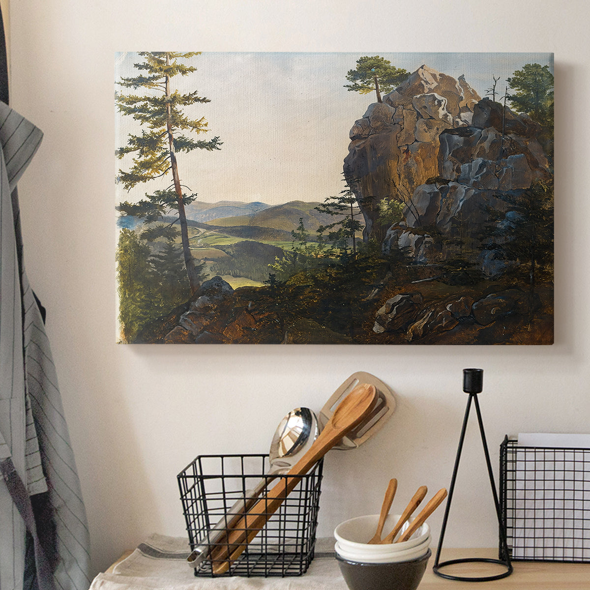 Canvas art print detailing a realistic countryside with geology, displayed in a softly lit workspace setting
