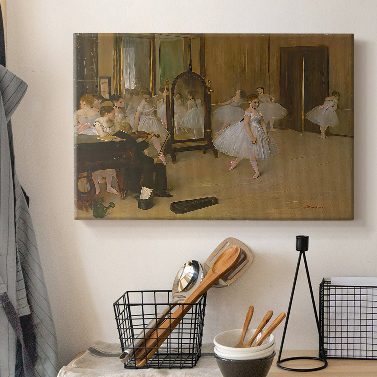 Canvas art print detailing a group of dancers mid-practice with teacher overseeing, displayed in a softly lit workspace setting