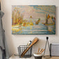 Canvas art print detailing a maritime structure and ships, displayed in a softly lit workspace setting