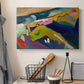 Canvas art print detailing a stylized composition featuring church within mountainous setting, displayed in a softly lit workspace setting