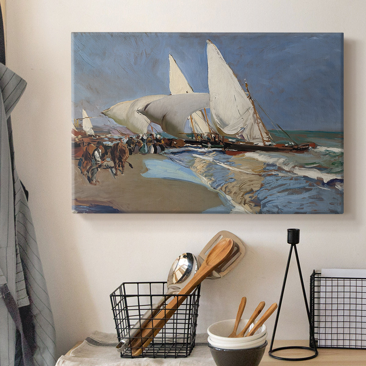 Canvas art print detailing a lively seaside composition with boats and people, displayed in a softly lit workspace setting