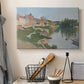 Canvas art print detailing a pointillist composition with town and natural surroundings, displayed in a softly lit workspace setting
