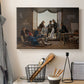 Canvas art print detailing multiple figures arranged in room with classical decor, displayed in a softly lit workspace setting