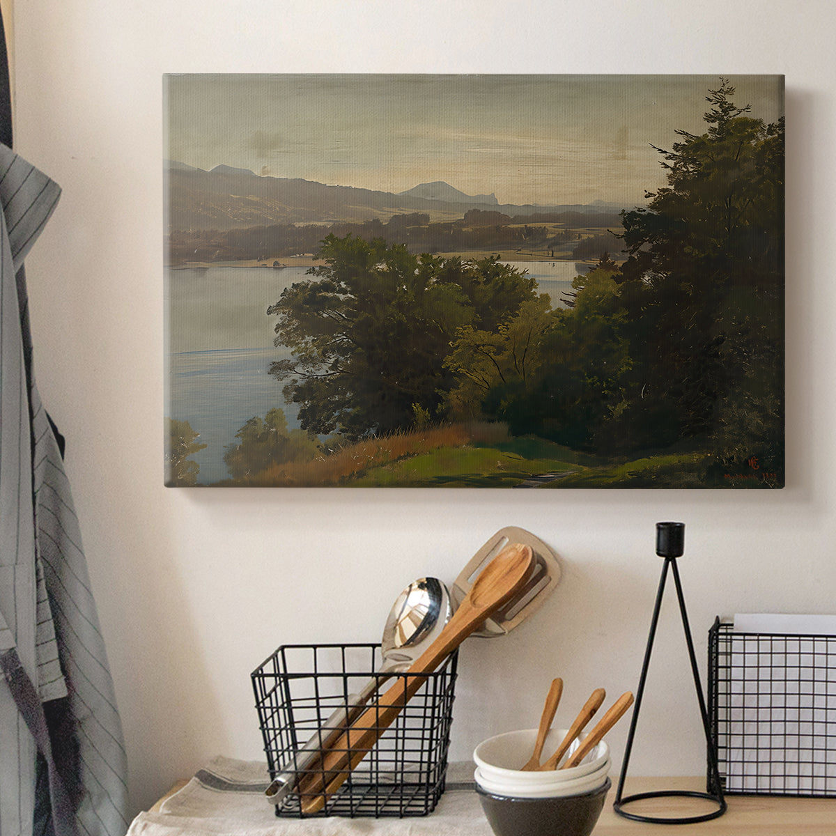 Canvas art print detailing a wide composition with water dominating foreground, displayed in a softly lit workspace setting
