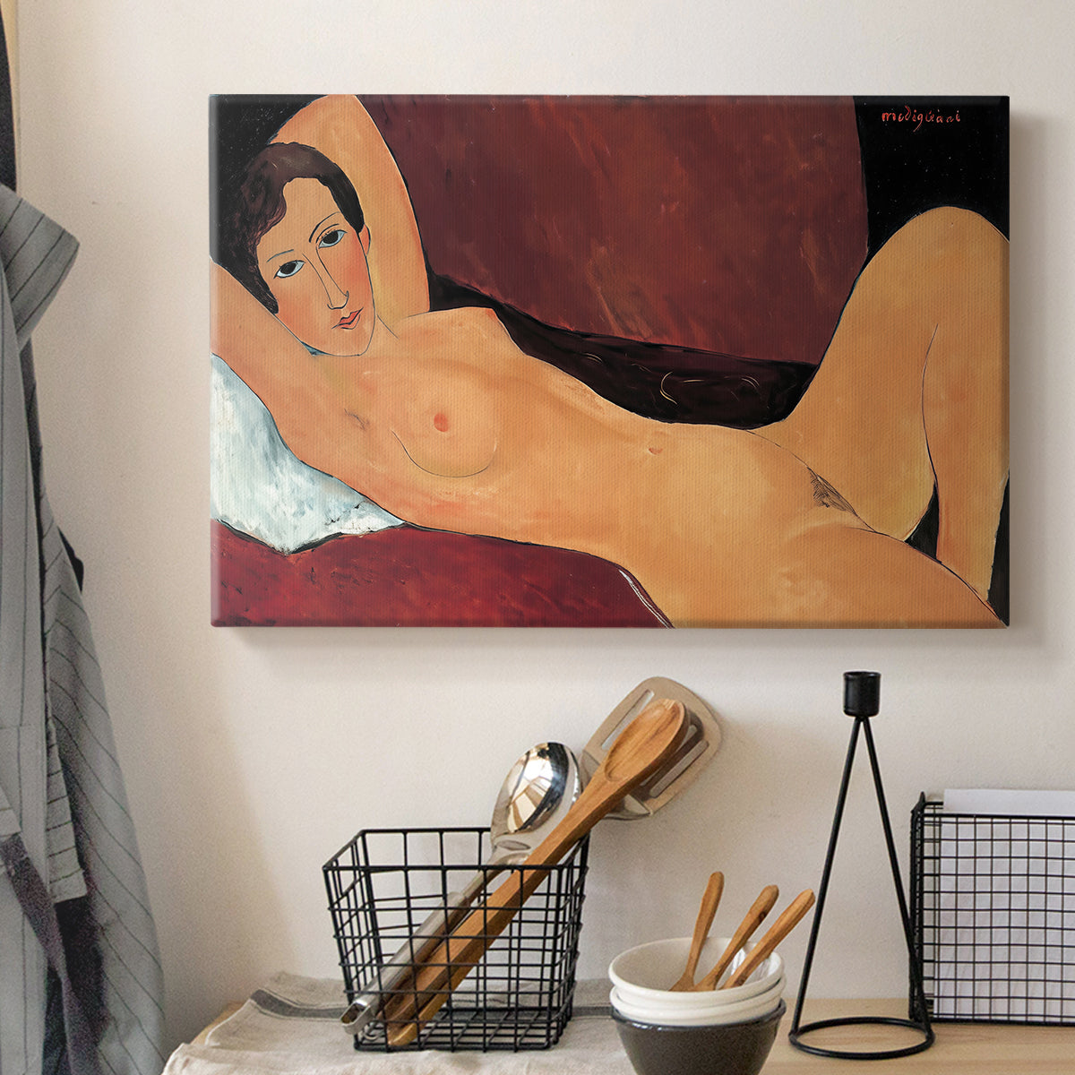 Canvas art print detailing an expressionist painting of nude woman reclining with minimal background, displayed in a softly lit workspace setting