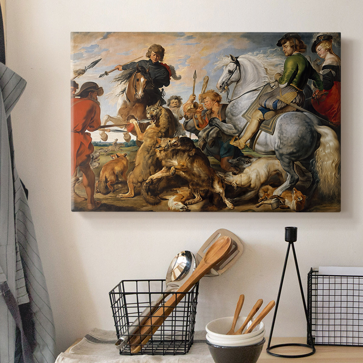 Canvas art print detailing a dramatic outdoor hunt with movement and conflict, displayed in a softly lit workspace setting