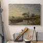 Canvas art print detailing a countryside view with barge and waterway, displayed in a softly lit workspace setting