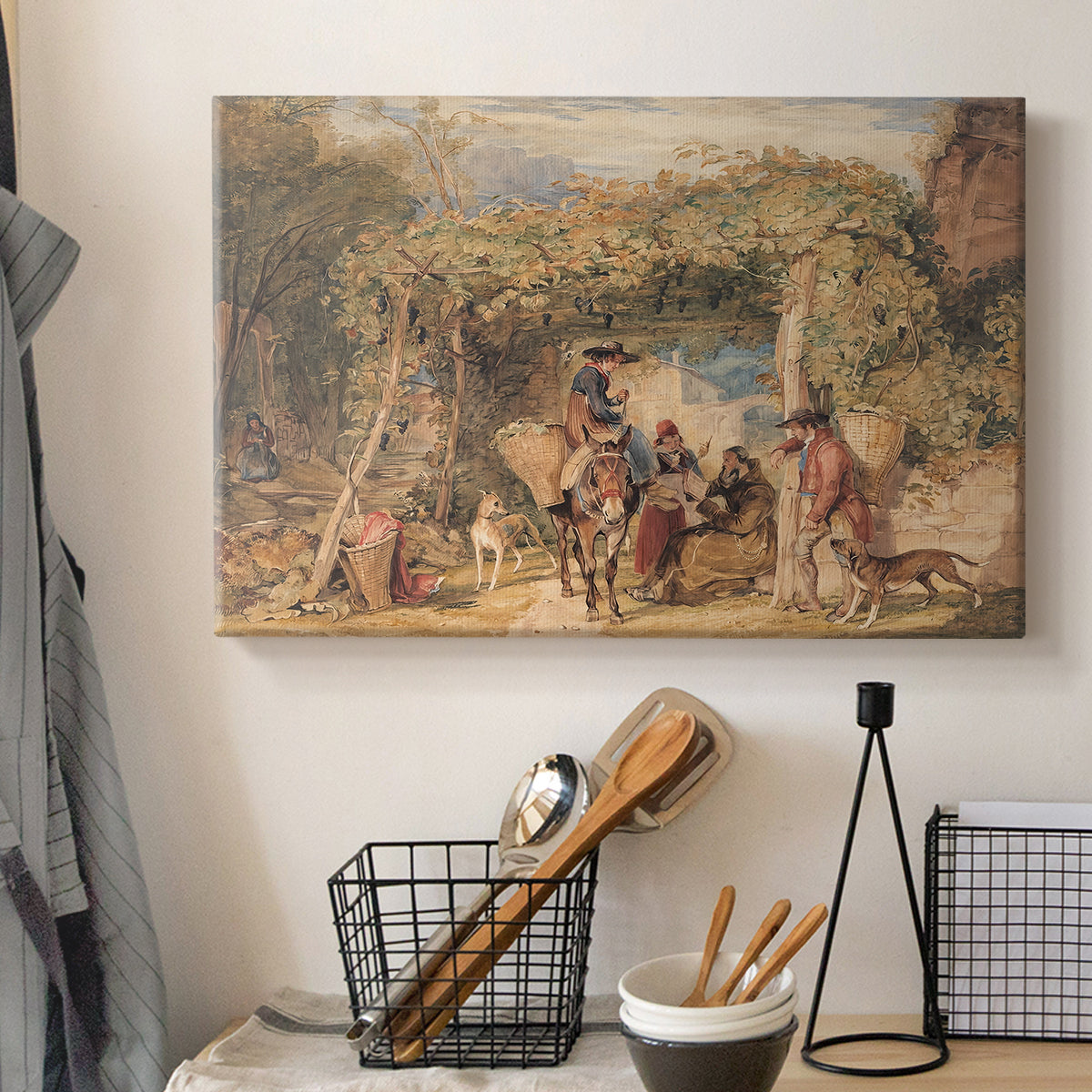Canvas art print detailing a stylized vineyard setting with figures and livestock, displayed in a softly lit workspace setting