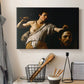 Canvas art print detailing an intense religious scene with figure emerging from darkness holding trophy, displayed in a softly lit workspace setting
