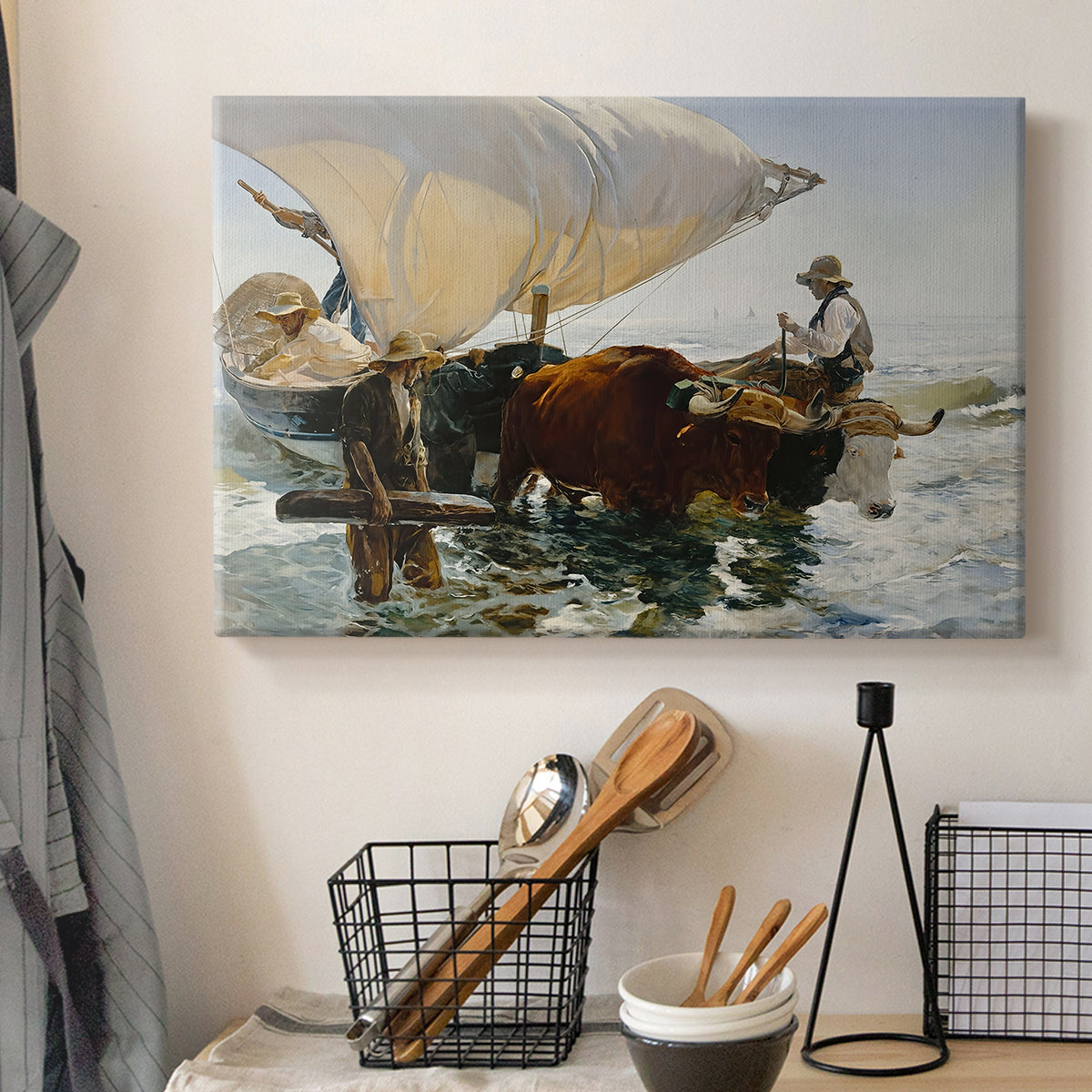 Canvas art print detailing an impressionist beach scene showing teamwork, displayed in a softly lit workspace setting