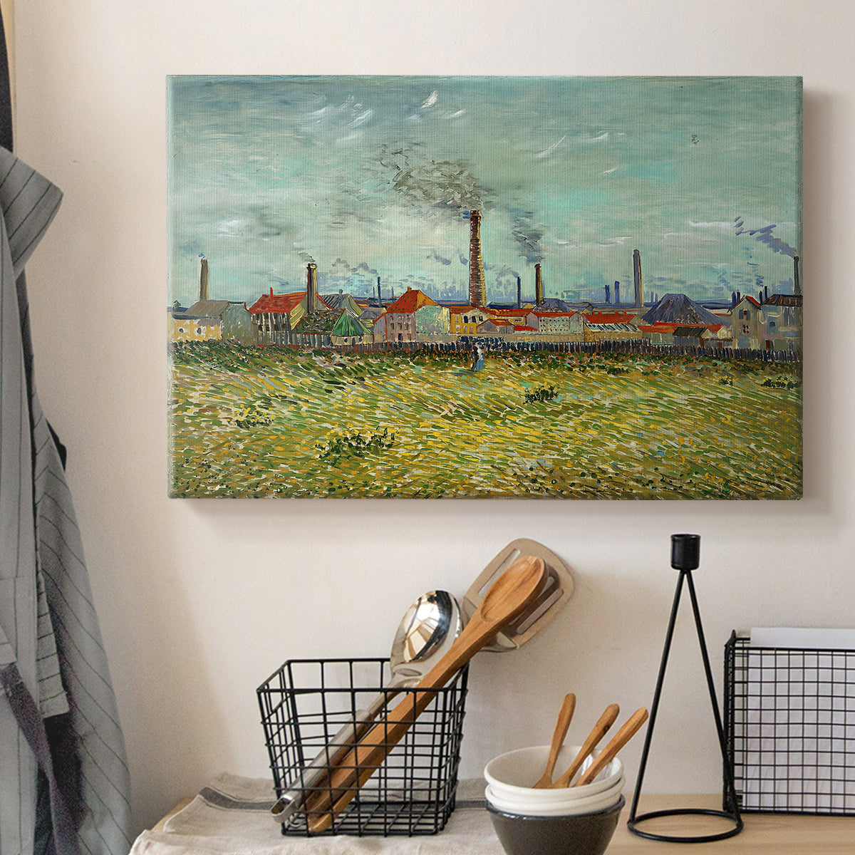Canvas art print detailing a post-impressionist composition combining buildings and horizon, displayed in a softly lit workspace setting