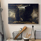 Canvas art print detailing an expansive geological landscape with dramatic elevation, displayed in a softly lit workspace setting