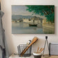 Canvas art print detailing a tranquil scene combining buildings, water, and sky, displayed in a softly lit workspace setting