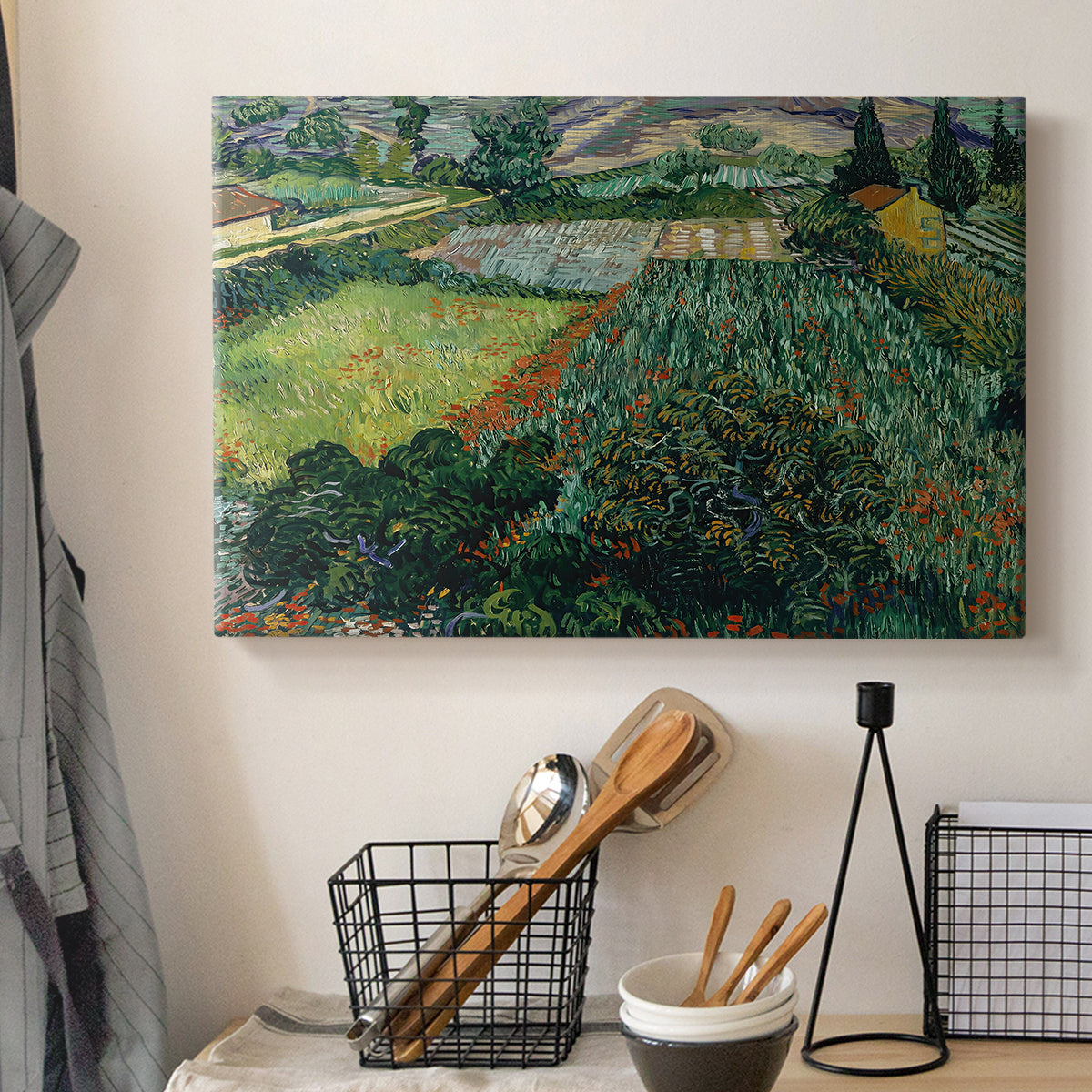 Canvas art print detailing a stylized field composition with vegetation, displayed in a softly lit workspace setting