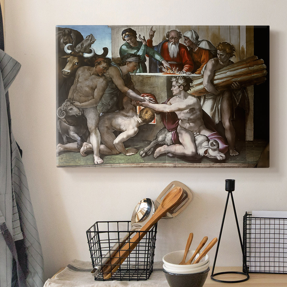 Canvas art print detailing a traditional depiction of biblical sacrifice, displayed in a softly lit workspace setting