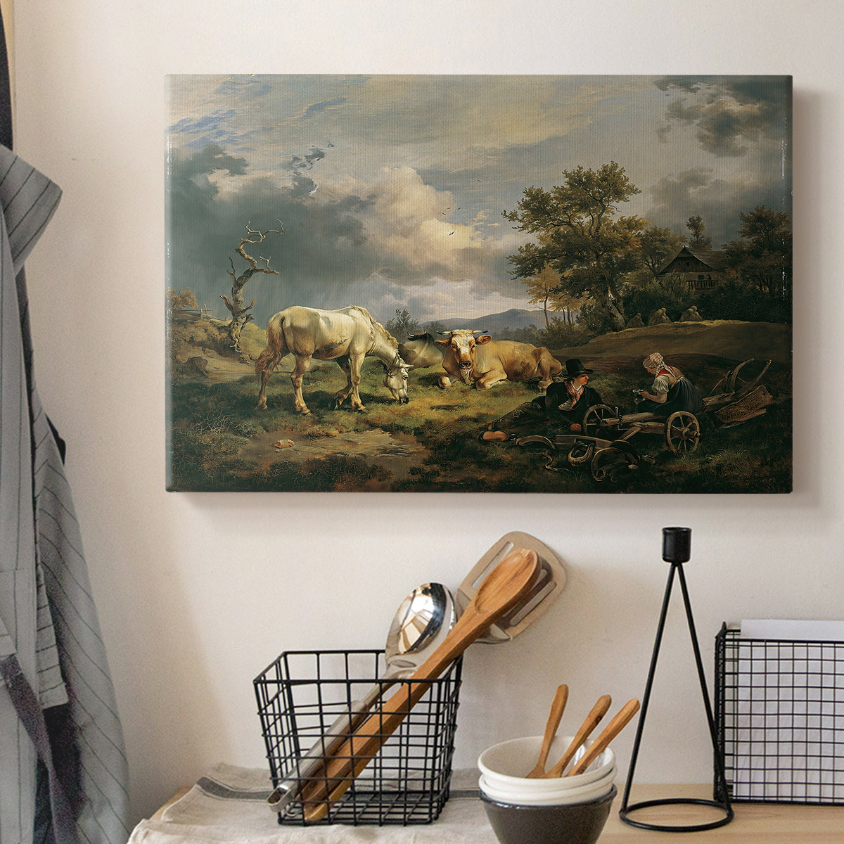 Canvas art print detailing a realistic depiction of resting couple, displayed in a softly lit workspace setting
