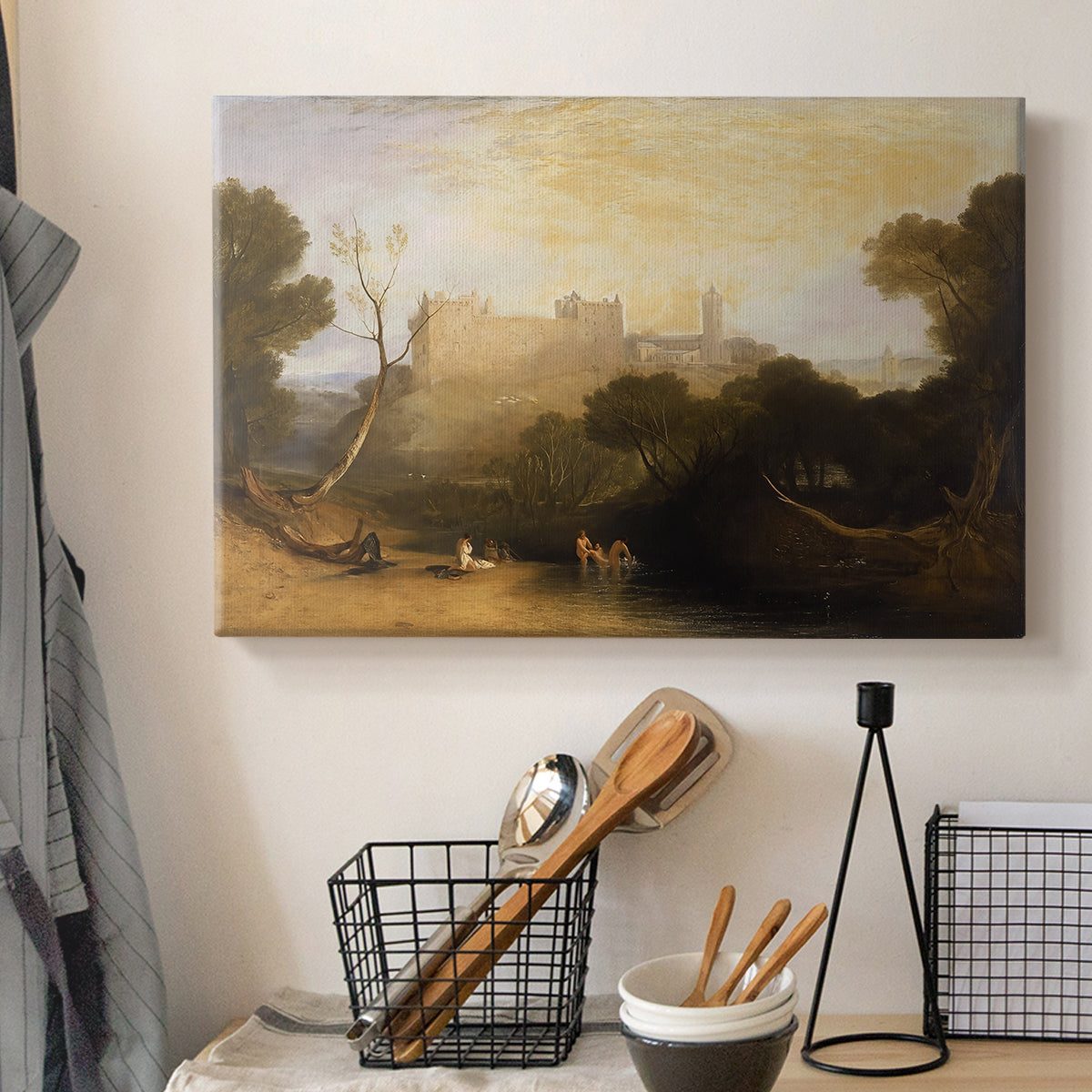 Canvas art print detailing a scenic composition combining palace and countryside, displayed in a softly lit workspace setting