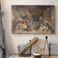 Canvas art print detailing a traditional gathering scene in simple room, displayed in a softly lit workspace setting