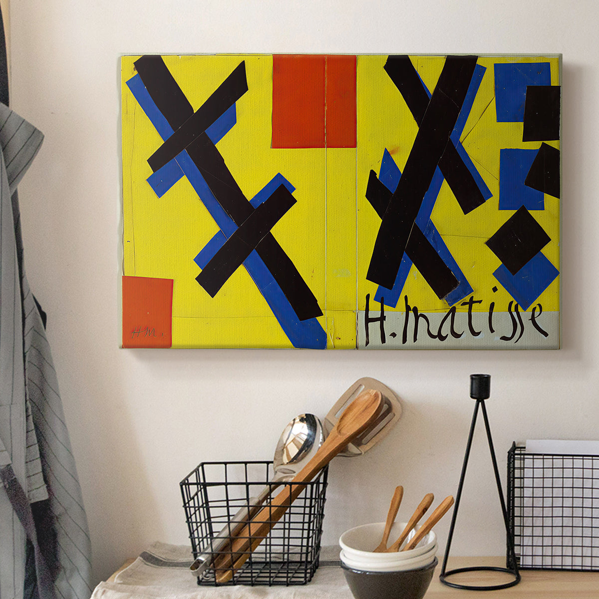 Canvas art print detailing a graphic artwork featuring abstract forms and design elements, displayed in a softly lit workspace setting