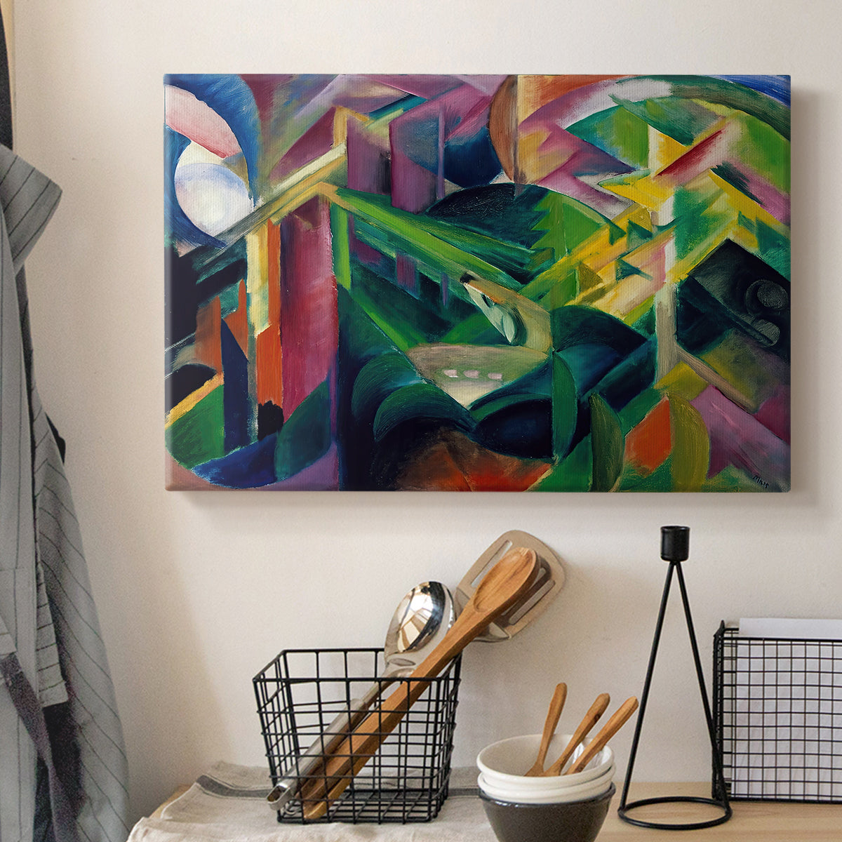 Canvas art print detailing a modern depiction of animals within patterned garden space, displayed in a softly lit workspace setting
