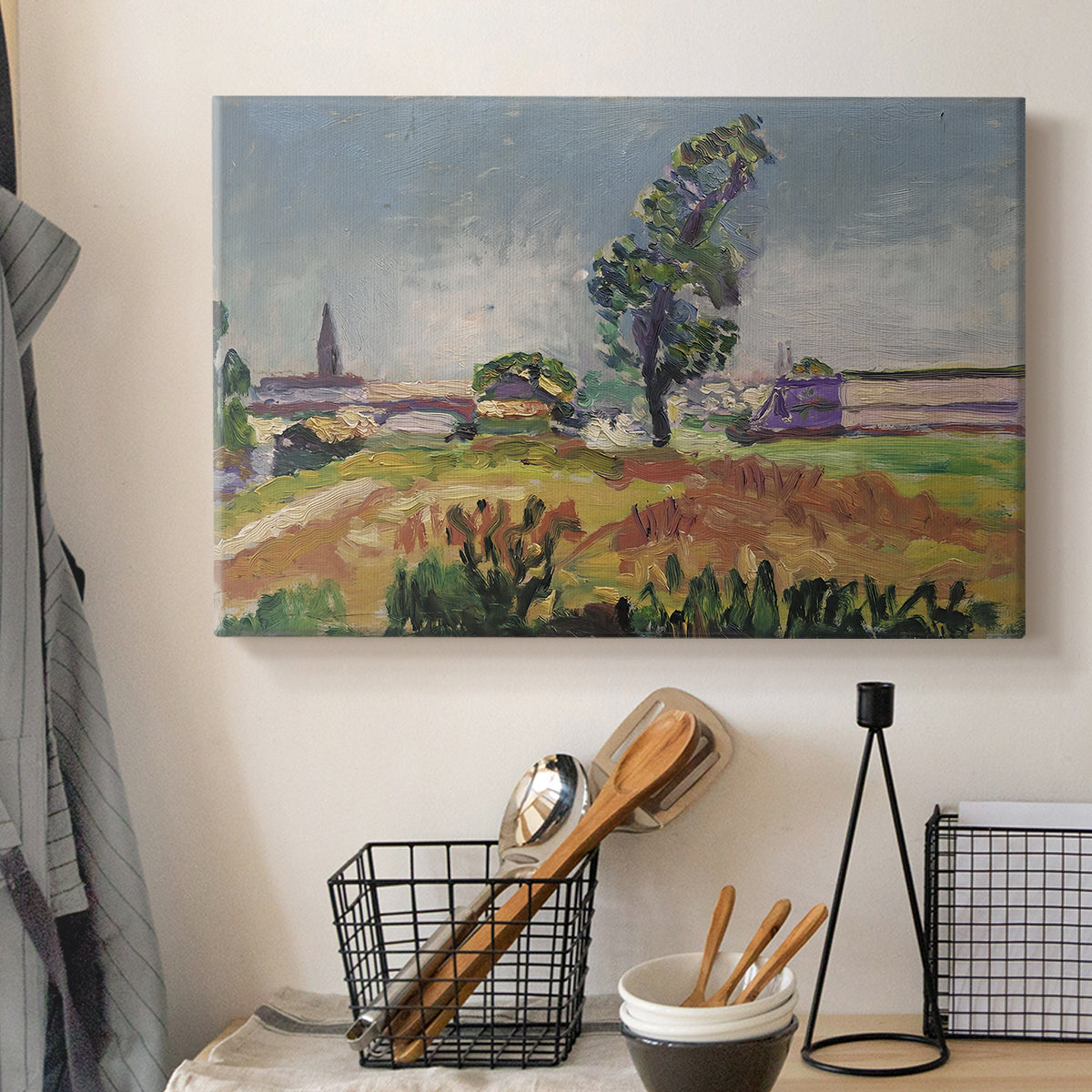 Canvas art print detailing a tranquil outdoor view centered on a bridge in nature, displayed in a softly lit workspace setting