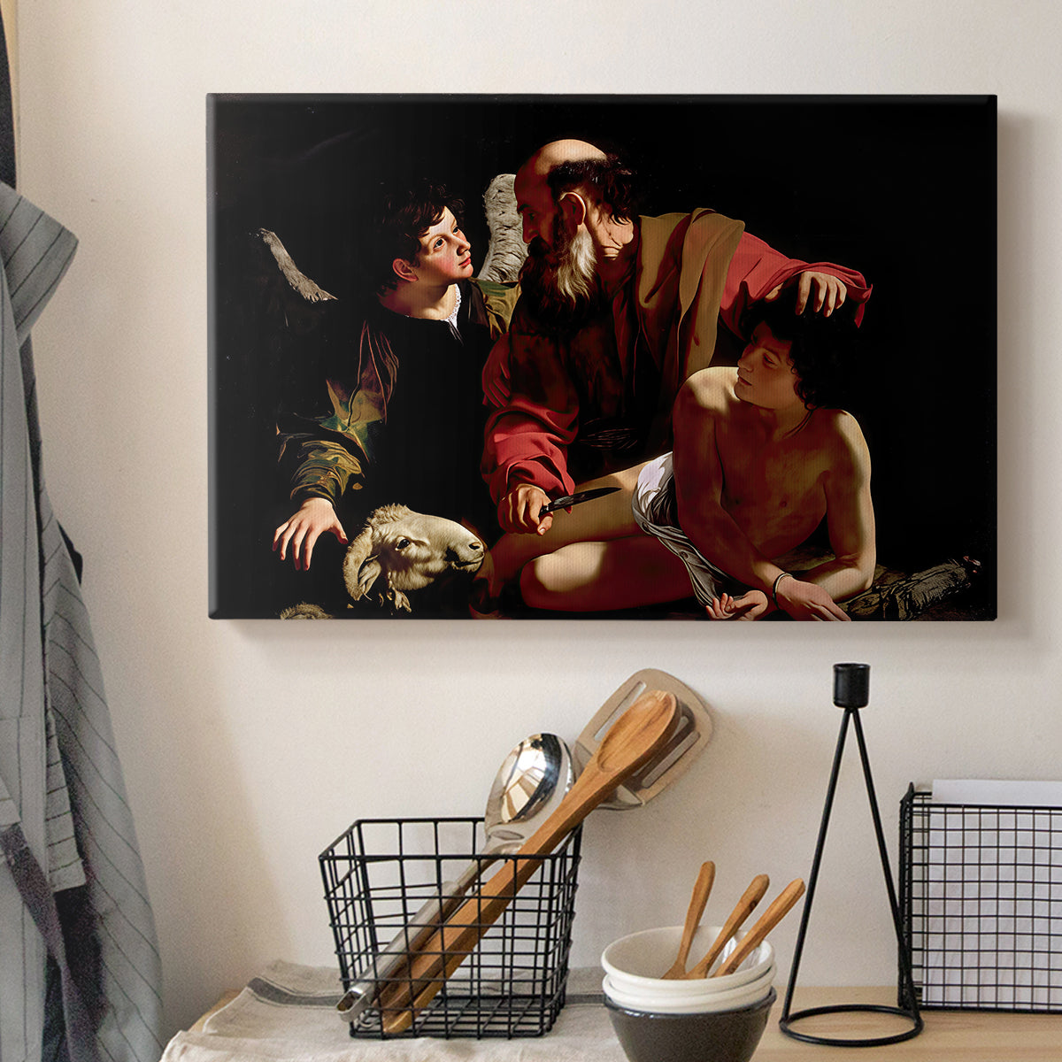 Canvas art print detailing an intense religious narrative with figures in close physical struggle, displayed in a softly lit workspace setting