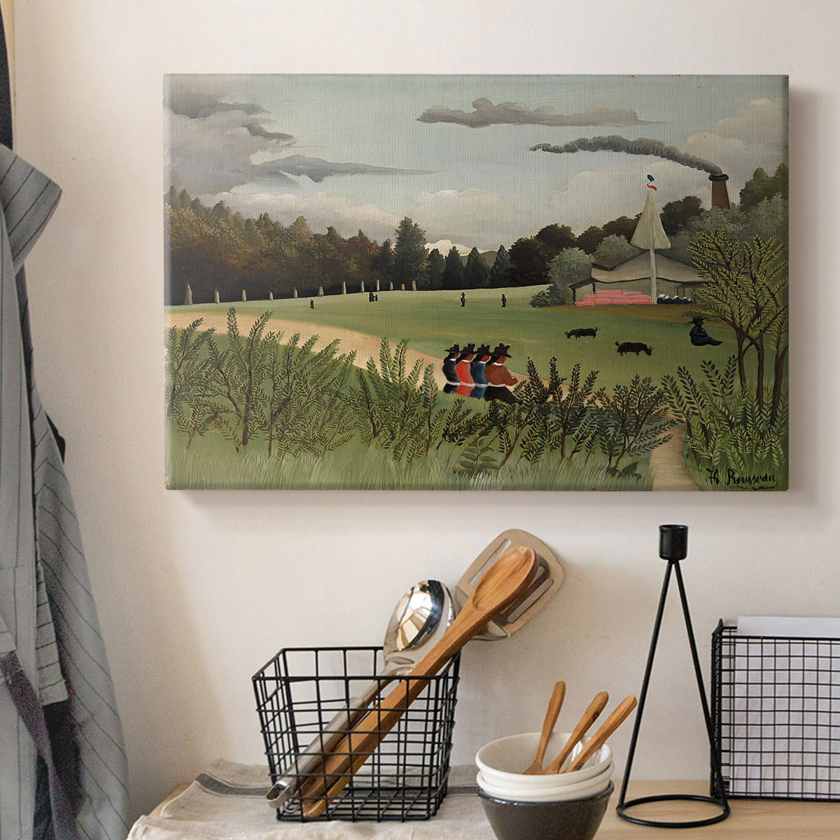 Canvas art print detailing an urban work environment with figures and factory, displayed in a softly lit workspace setting