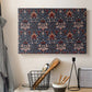 Canvas art print detailing a structured botanical motif with repeating curved shapes, displayed in a softly lit workspace setting