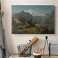 Canvas art print detailing an expansive Nordic view with shoreline and distant mountains, displayed in a softly lit workspace setting