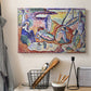 Canvas art print detailing a Fauvist coastal gathering with bright broken color, displayed in a softly lit workspace setting