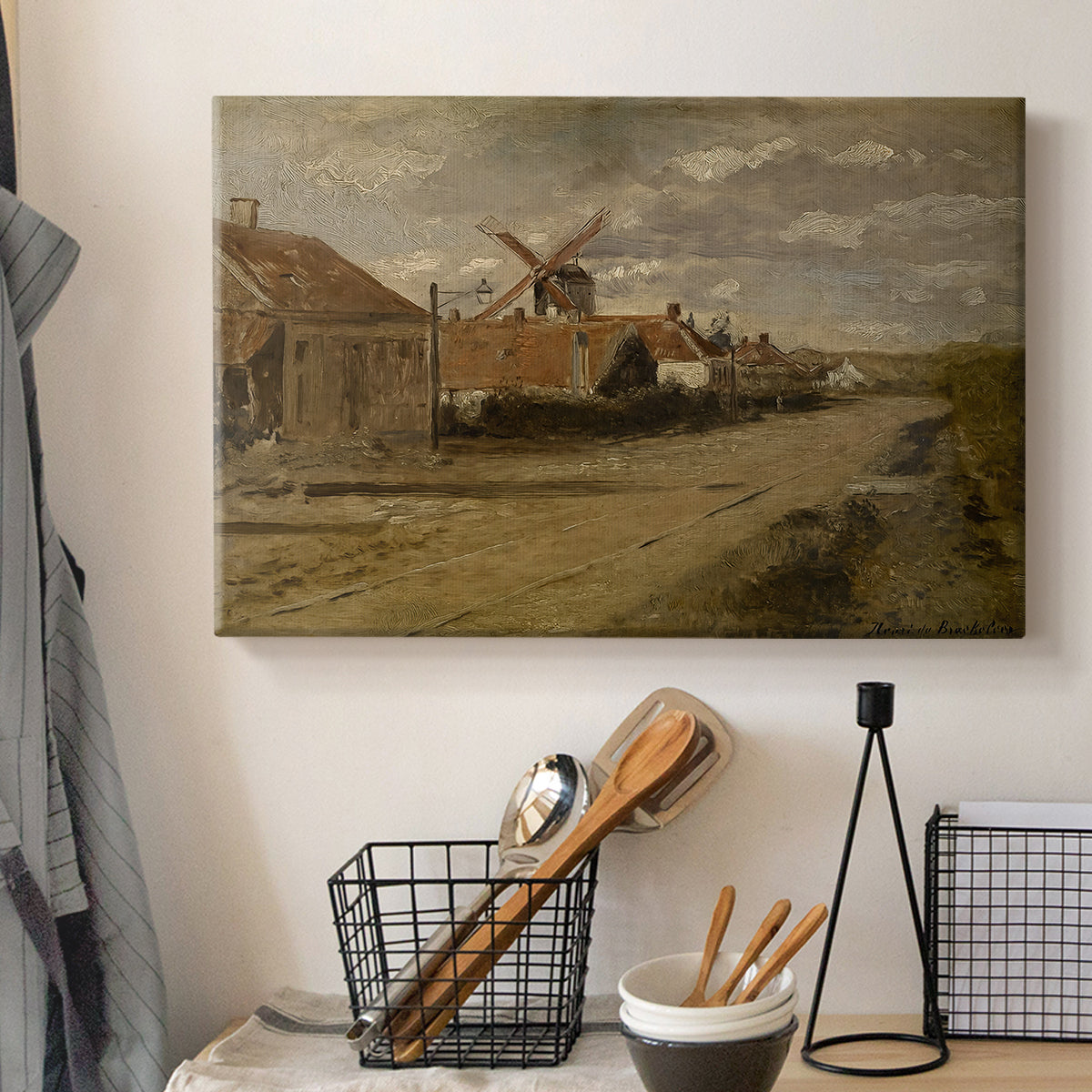 Canvas art print detailing a landscape featuring mill and calm environment, displayed in a softly lit workspace setting