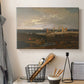 Canvas art print detailing an expressive coastal landscape, displayed in a softly lit workspace setting