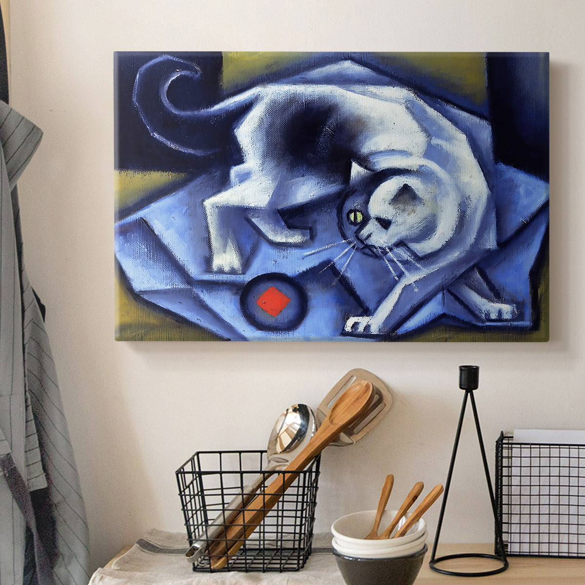 Canvas art print detailing an abstract scene combining cat and object, displayed in a softly lit workspace setting