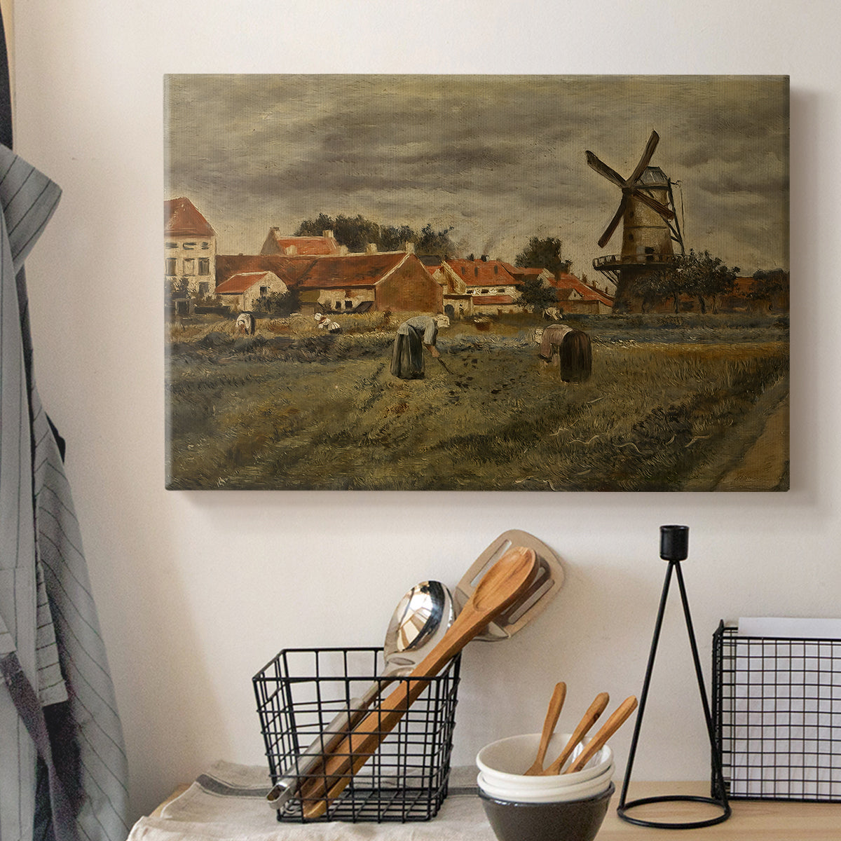 Canvas art print detailing an outdoor scene combining architecture and labor, displayed in a softly lit workspace setting