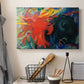 Canvas art print detailing a non-representational composition with swirling forms and contrast, displayed in a softly lit workspace setting