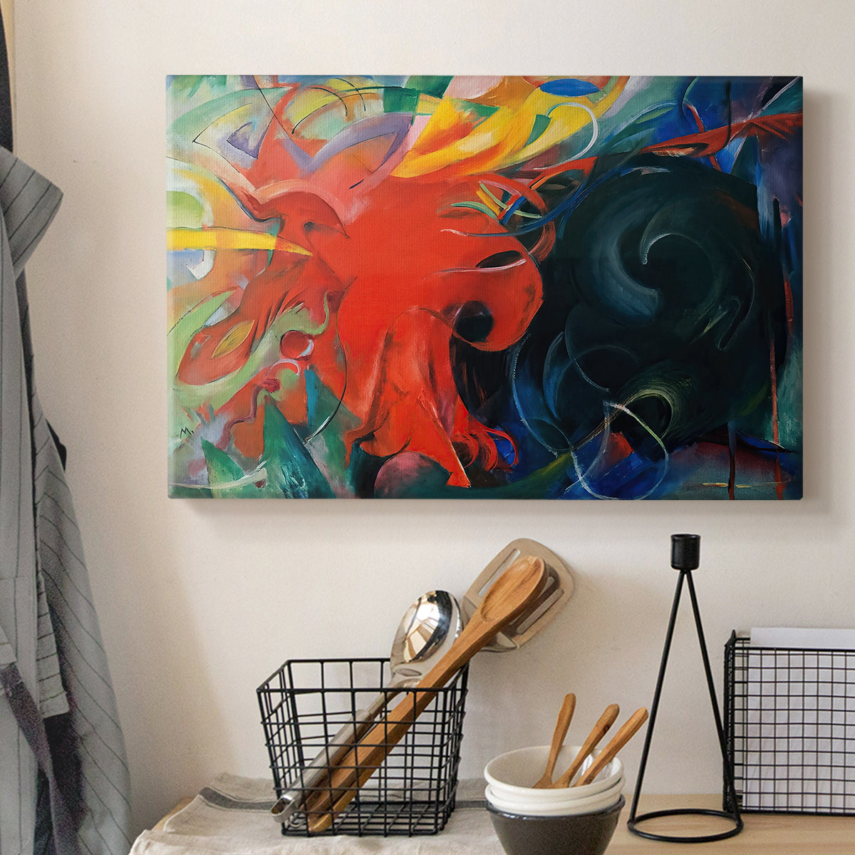 Canvas art print detailing a non-representational composition with swirling forms and contrast, displayed in a softly lit workspace setting
