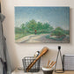 Canvas art print detailing a stylized urban garden composition, displayed in a softly lit workspace setting