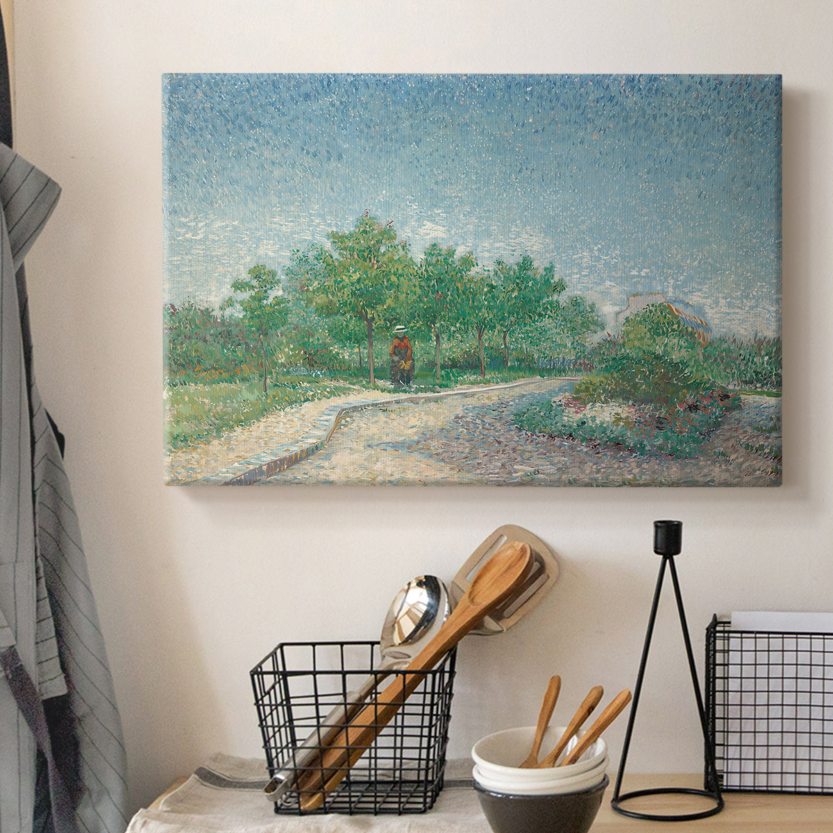 Canvas art print detailing a stylized urban garden composition, displayed in a softly lit workspace setting