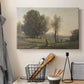 Canvas art print detailing a subdued natural setting with open space and sky, displayed in a softly lit workspace setting