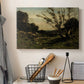 Canvas art print detailing a tranquil landscape capturing morning light and stillness, displayed in a softly lit workspace setting
