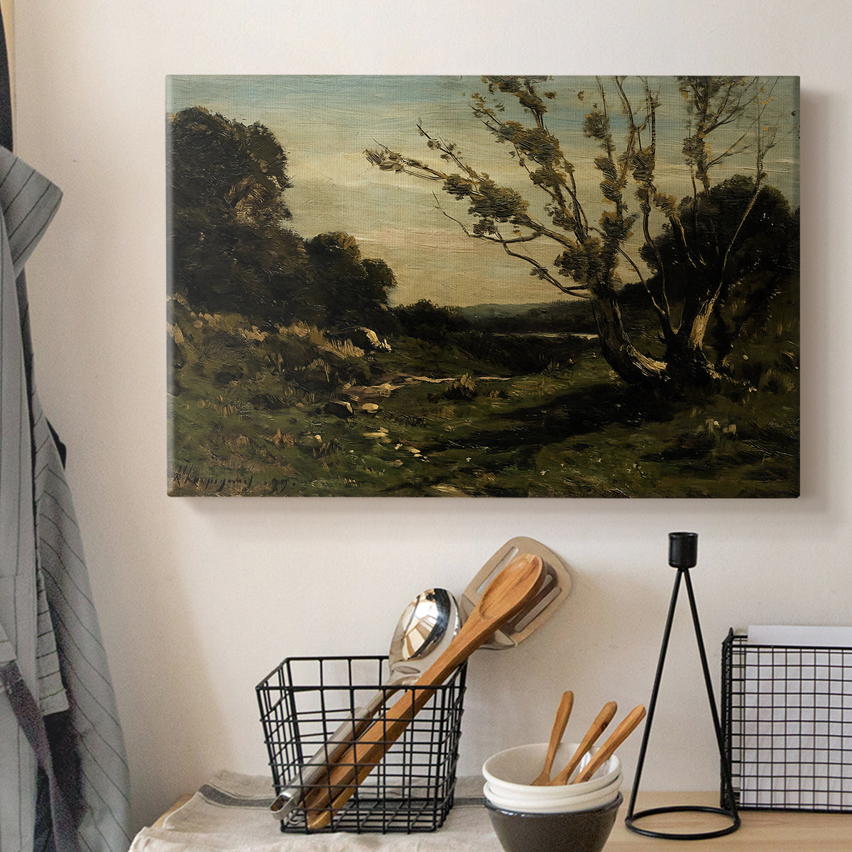Canvas art print detailing a tranquil landscape capturing morning light and stillness, displayed in a softly lit workspace setting