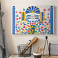 Canvas art print detailing a decorative artwork with geometric motifs and vibrant colors, displayed in a softly lit workspace setting