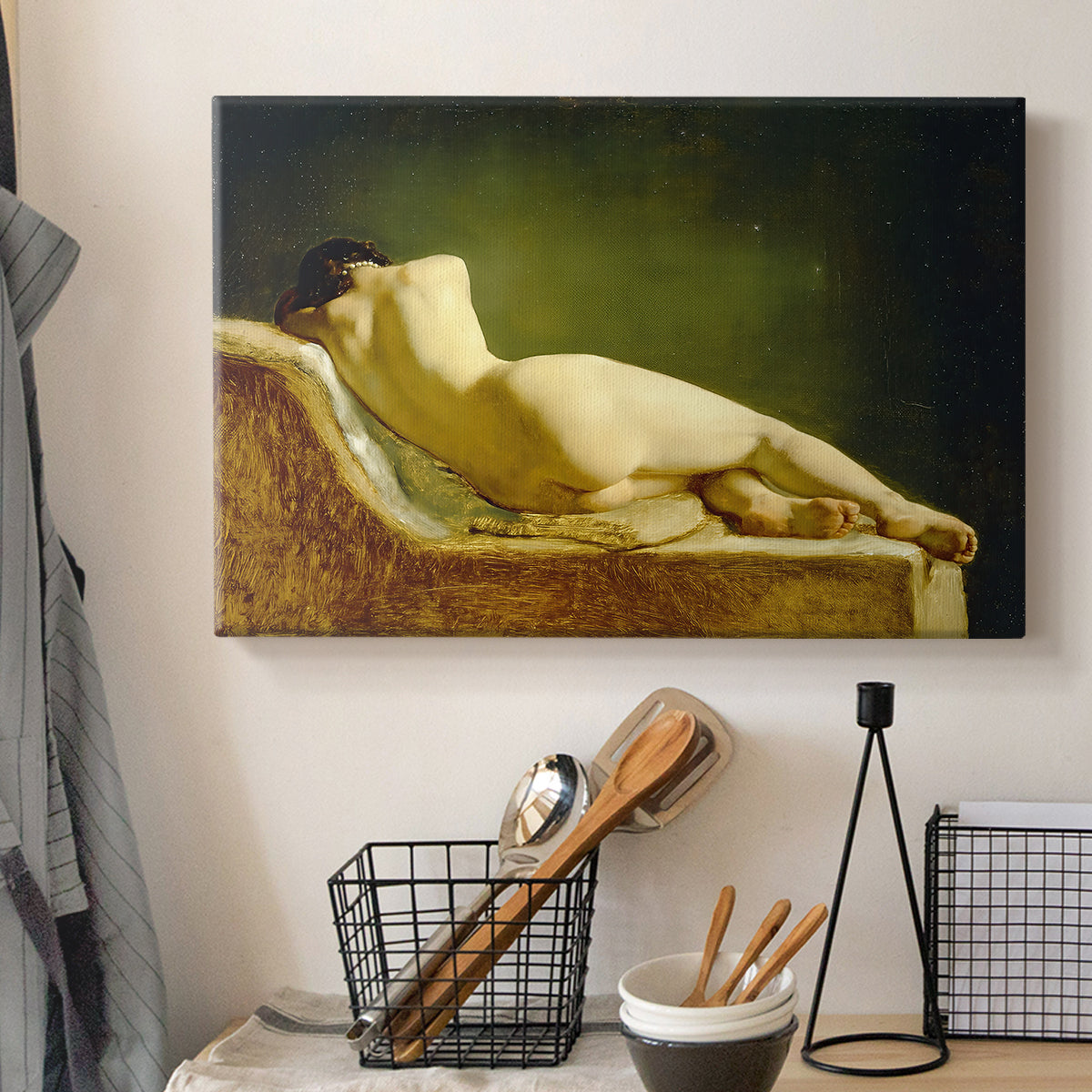 Canvas art print detailing an interior scene focusing on single resting figure, displayed in a softly lit workspace setting
