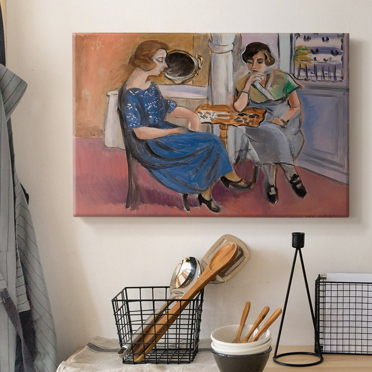 Canvas art print detailing an expressive composition of two people playing dominoes, displayed in a softly lit workspace setting