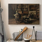 Canvas art print detailing a studio setting with layered objects and muted lighting, displayed in a softly lit workspace setting