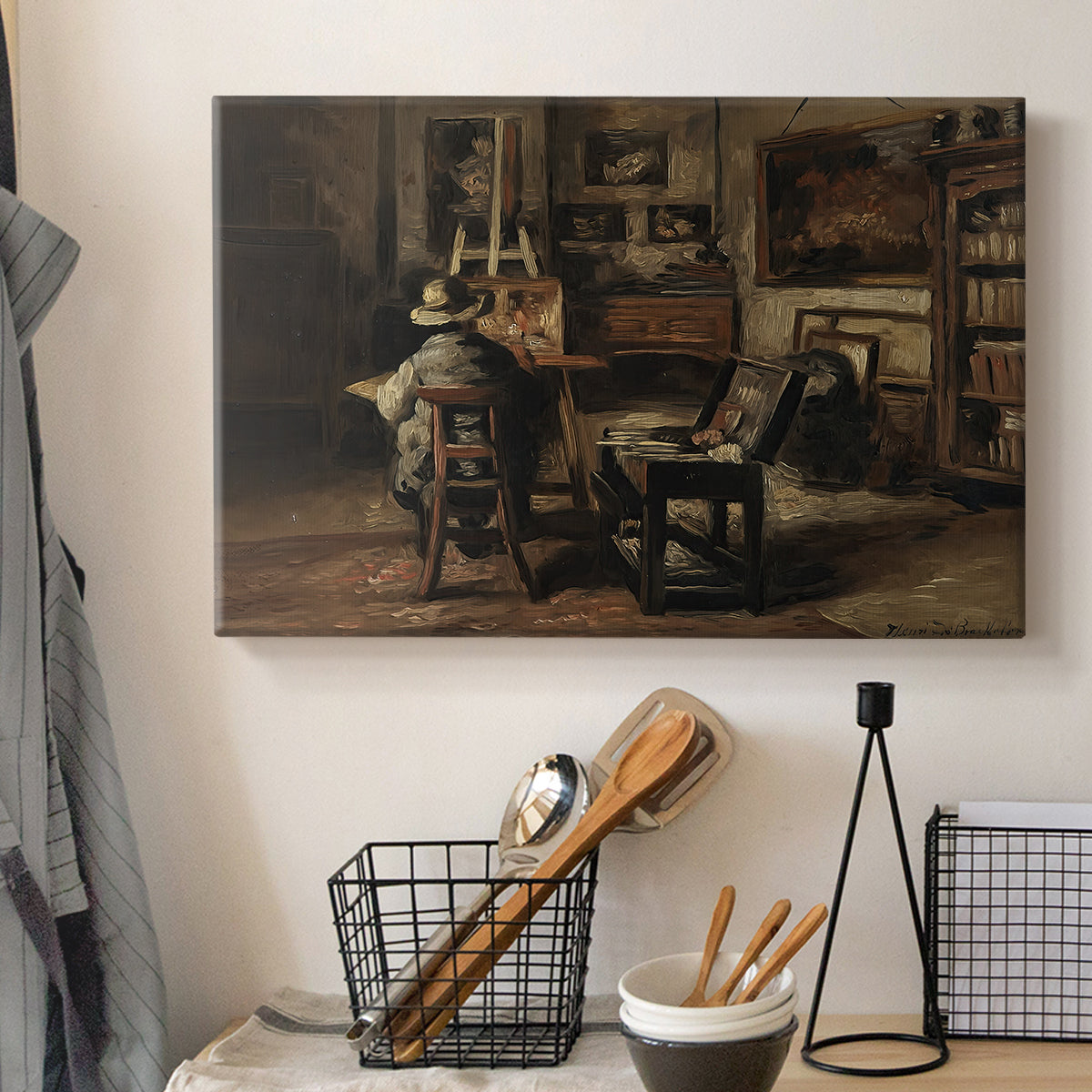 Canvas art print detailing a studio setting with layered objects and muted lighting, displayed in a softly lit workspace setting