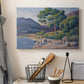 Canvas art print detailing a seaside scene with bathers, displayed in a softly lit workspace setting