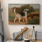 Canvas art print detailing a countryside scene featuring single hound, displayed in a softly lit workspace setting