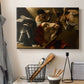 Canvas art print detailing an intense religious composition with strong shadow and physical struggle, displayed in a softly lit workspace setting