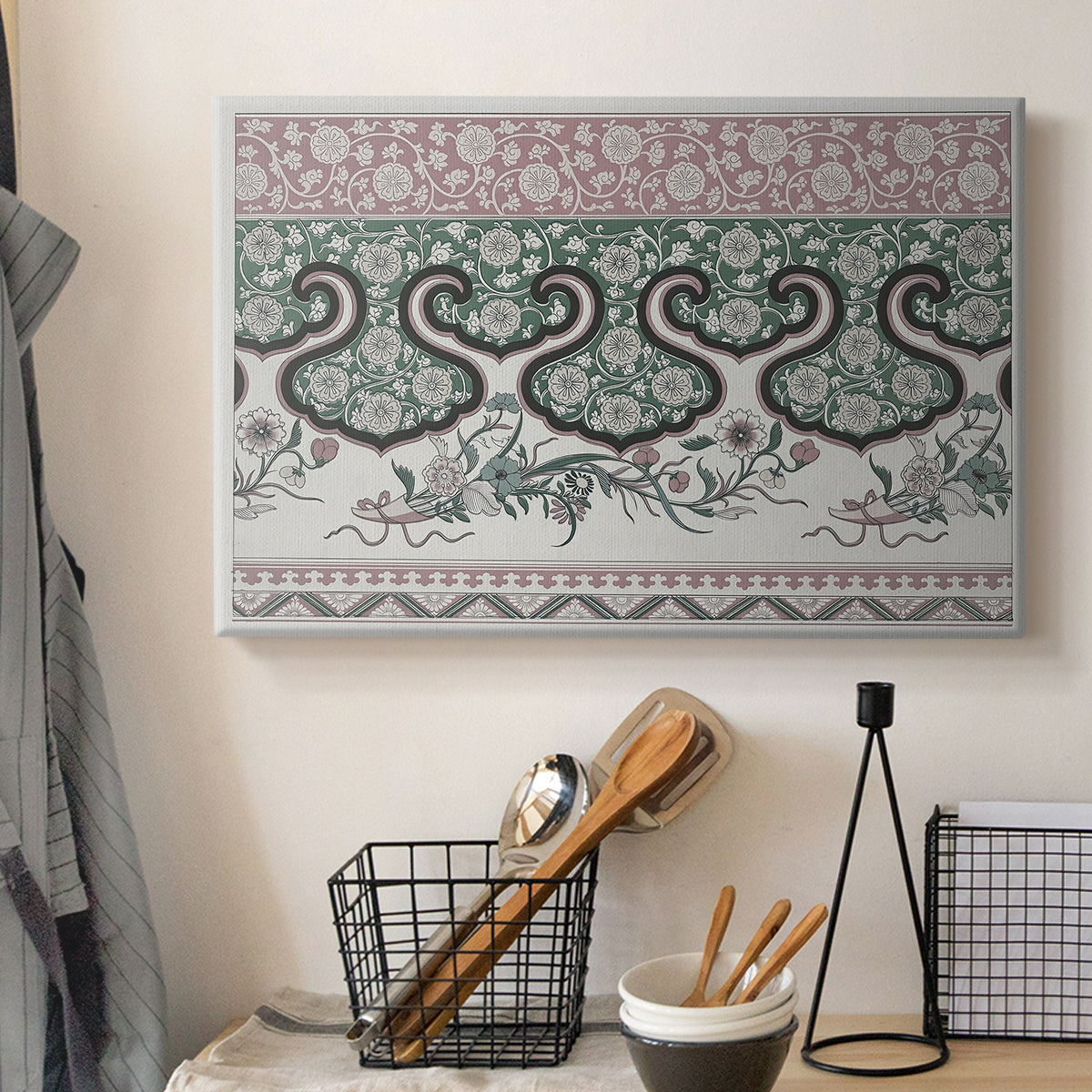Canvas art print detailing a textile-style design with repeating curved and linear shapes, displayed in a softly lit workspace setting